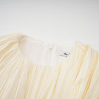 Cyrielle Pleated Mini Dress Round Neck Asymmetrical Ribbon Design Detail Neutrals