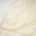 Cyrielle Pleated Mini Dress Round Neck Asymmetrical Ribbon Design Detail Neutrals