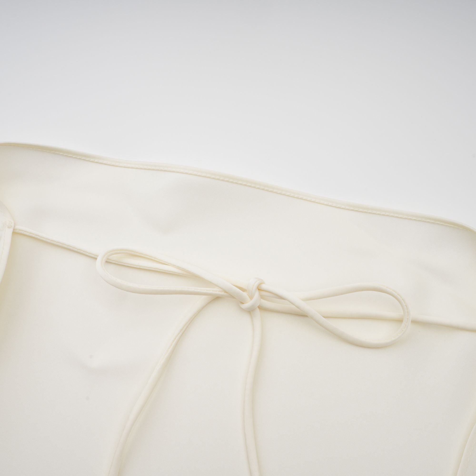 Lyna White Satin Ruffled Mini Dress Sleeveless Shawl Panel Detail
