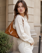 Ida Patent Shoulder Bag Curved Shape Glossy Finish Compact Design Chocolate