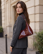 Ida Patent Shoulder Bag Curved Shape Glossy Finish Compact Design Chocolate