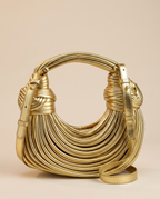 Romy Sculptural Handbag Knotted Handle Curved Ribbed Shape Gold